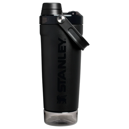 Front view of the black Stanley Activate Shaker Bottle featuring the side handle, leakproof lid, and transparent base storage jar.
